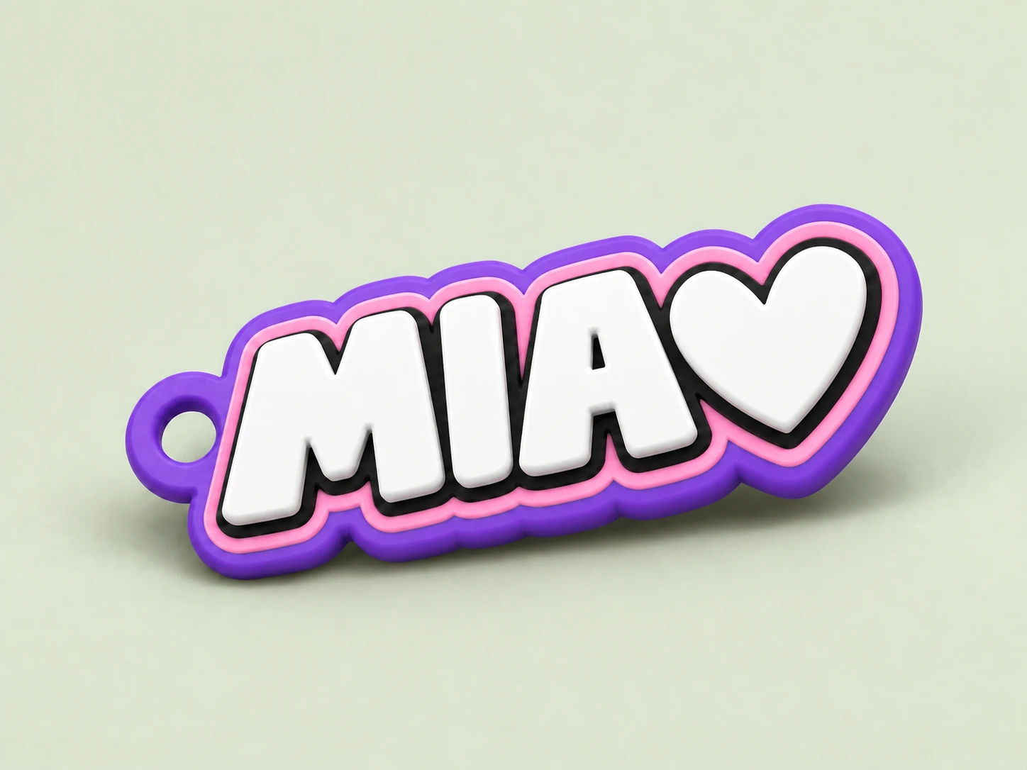 MIA heart keychain tag in purple, pink, black and white