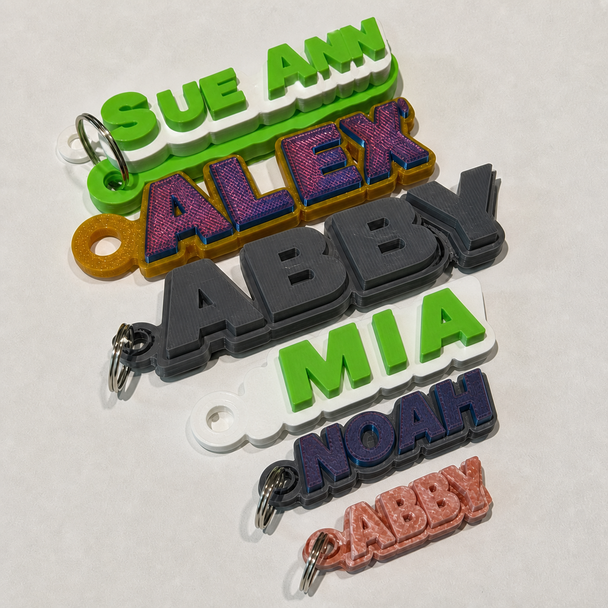 A selection of real personalized NUU3D keychains